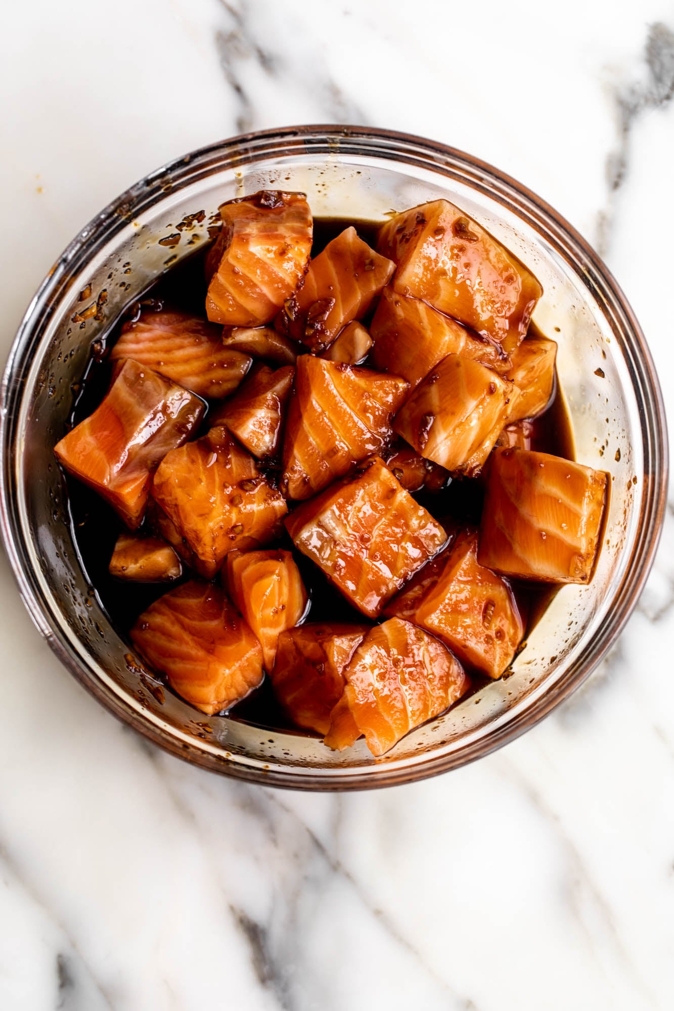 marinated salmon in teriyaki sauce for teriyaki salmon bowl.