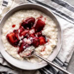 vanilla rice pudding topped with roasted strawberries.