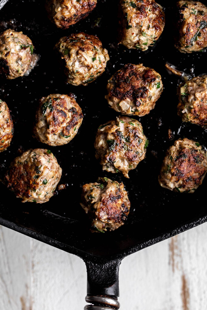 Lamb Meatballs cooked in skillet 