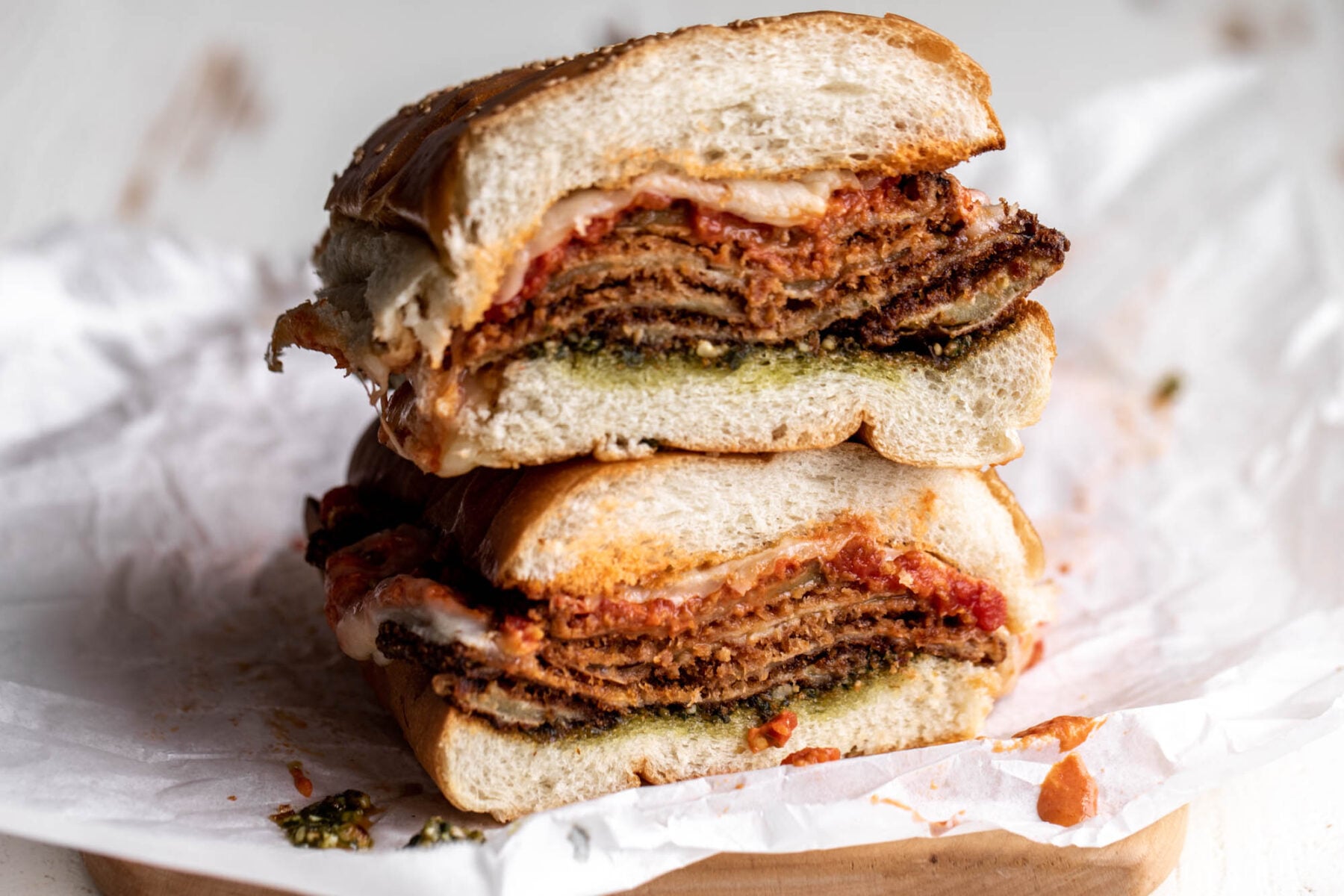 tie dye eggplant parmesan sandwich with pesto, marinara and vodka sauce with mozzarella.