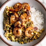 sautéed shrimp with creamed shishitos and corn over white rice.