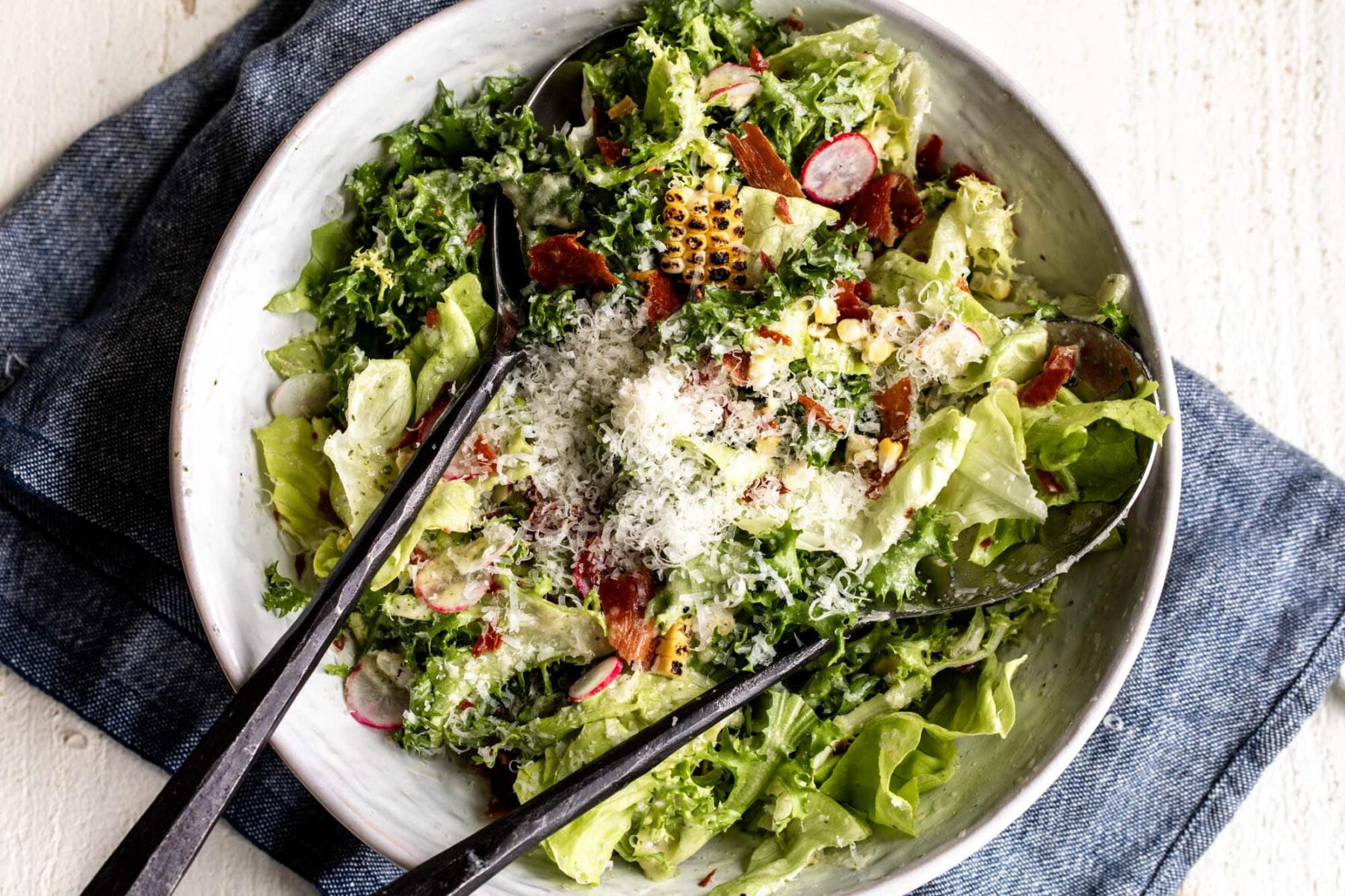 summer butter lettuce salad with charred corn and crispy prosciutto.