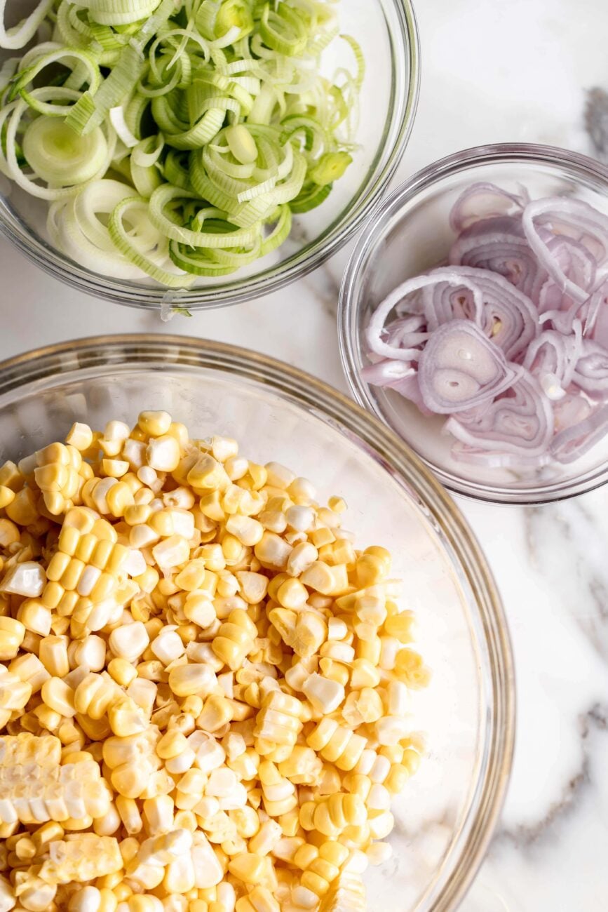 sliced leeks, shallots and corn kernels.