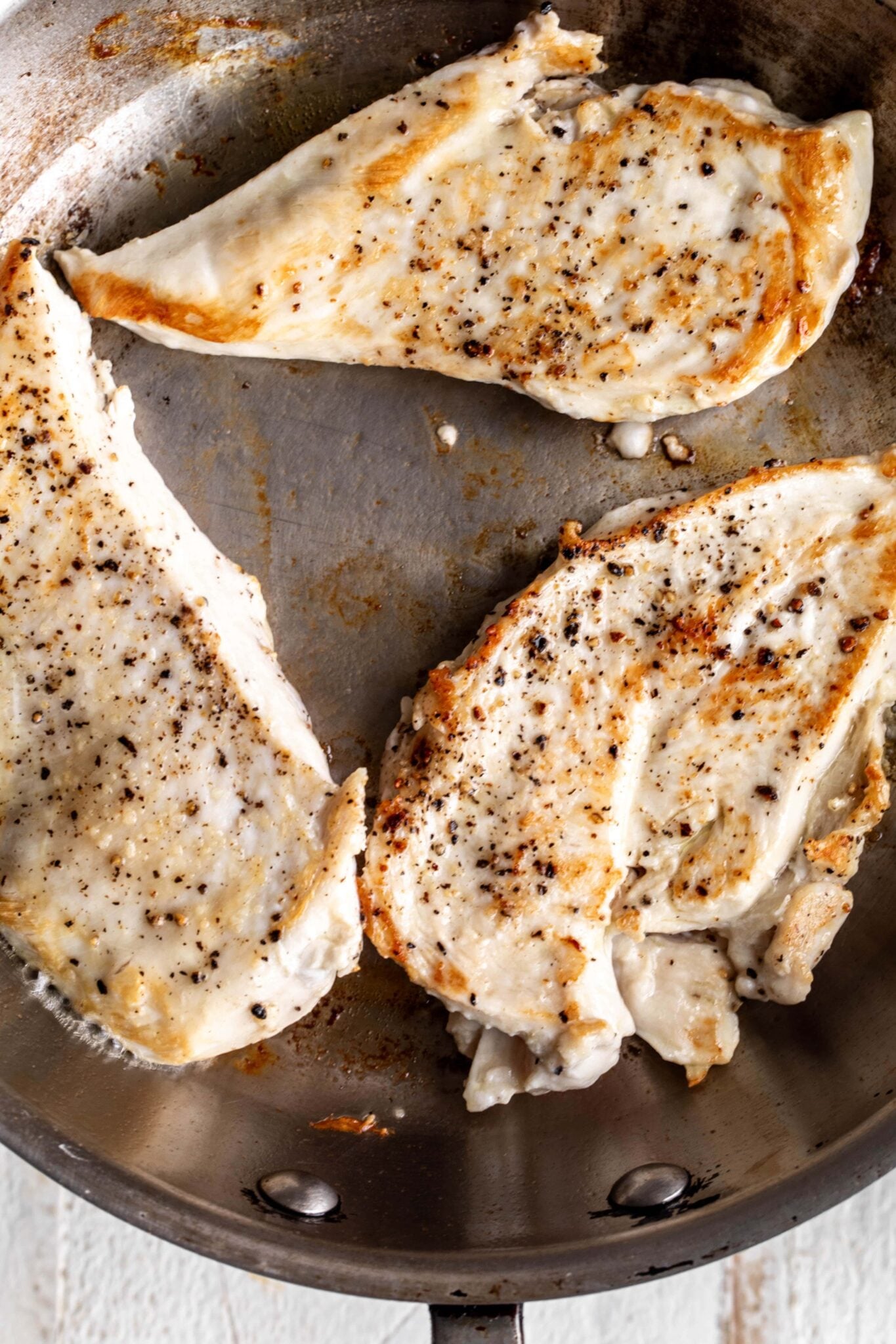 Spinach Artichoke Chicken Cooking with Cocktail Rings