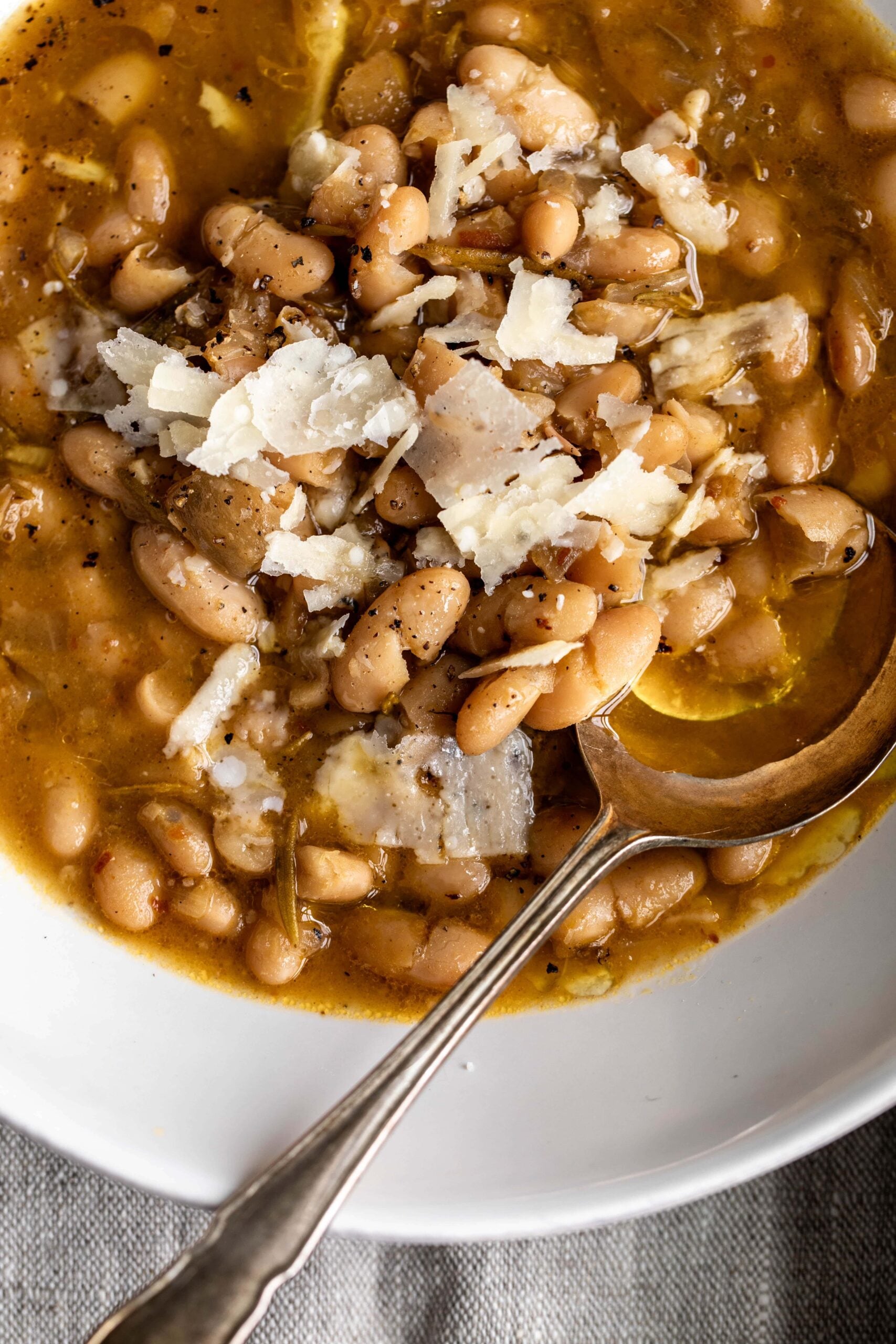Brothy White Beans with parmesan cheese.