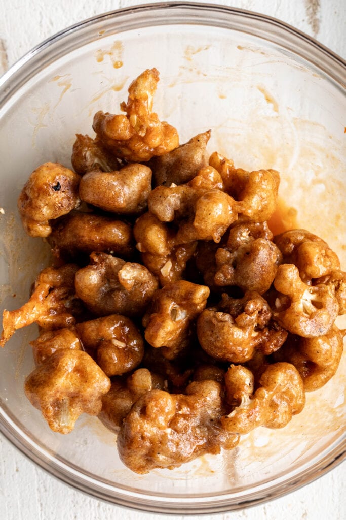 battered and fried cauliflower in oil tossed in buffalo sauce.