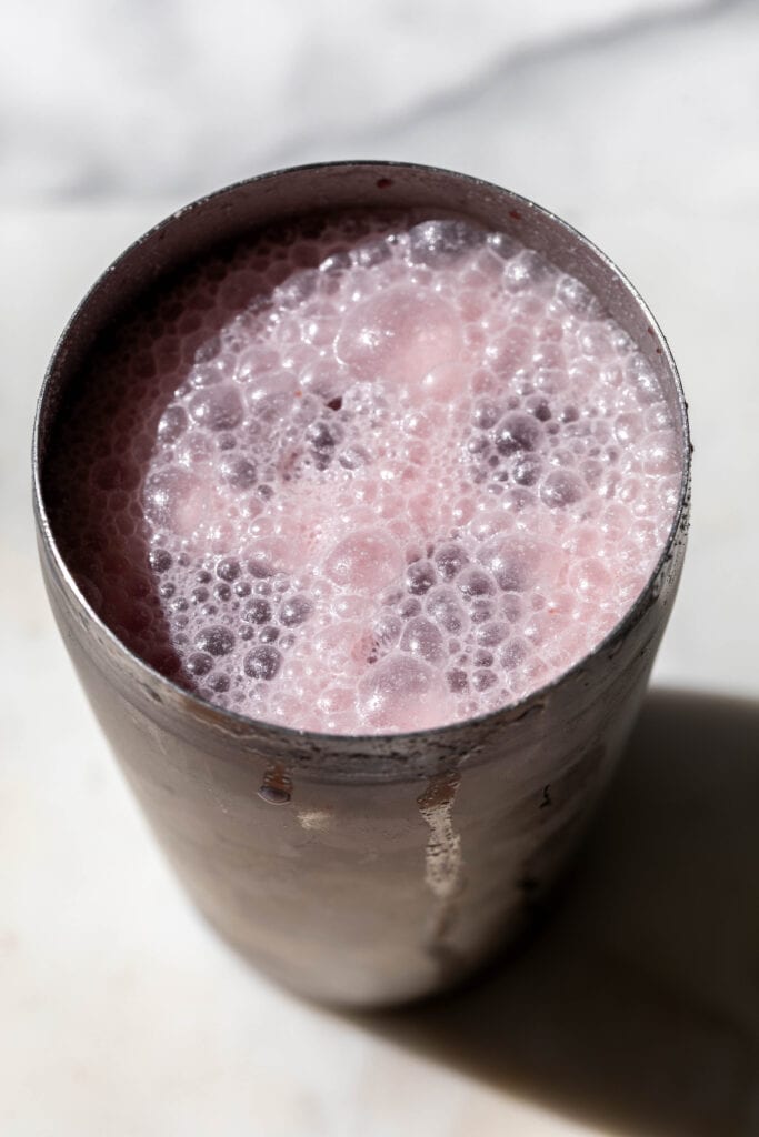 ingredients for Coconut Hibiscus Refresher in a cocktail shaker