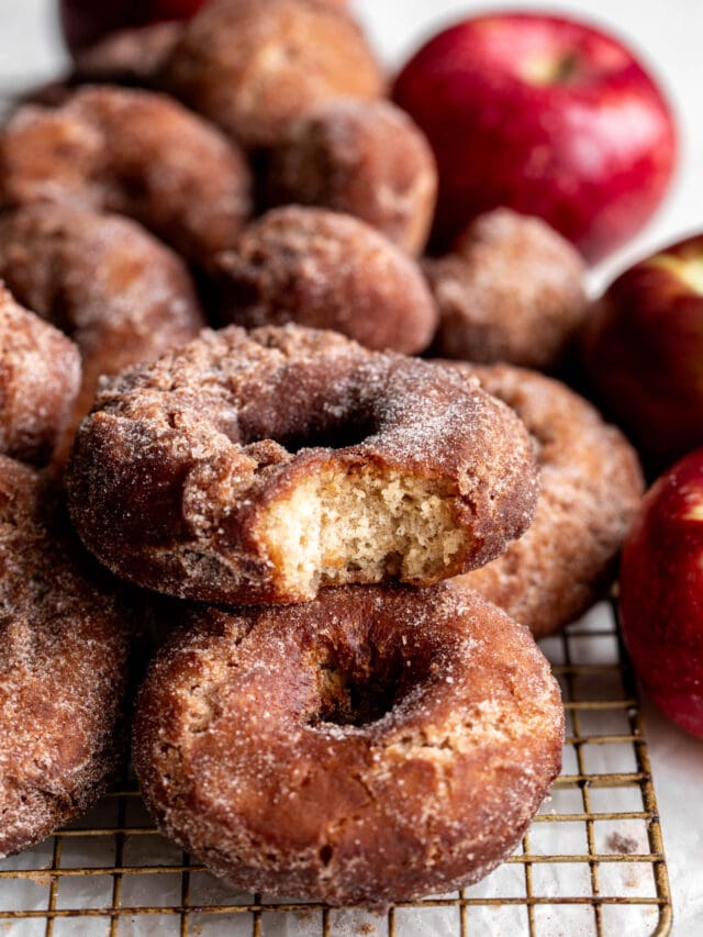 Classic old fashioned-style fried apple cider donuts rolled in cinnamon sugar.