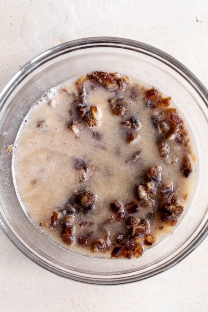 softened dates in mixing bowl.