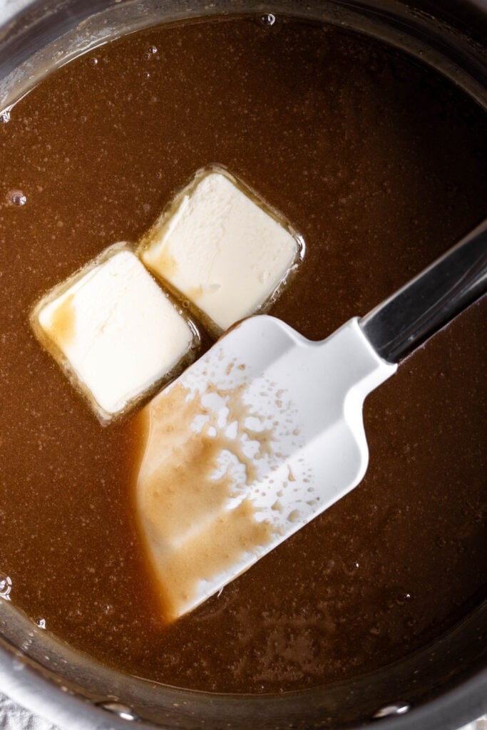 sticky toffee sauce finished with pats of butter.