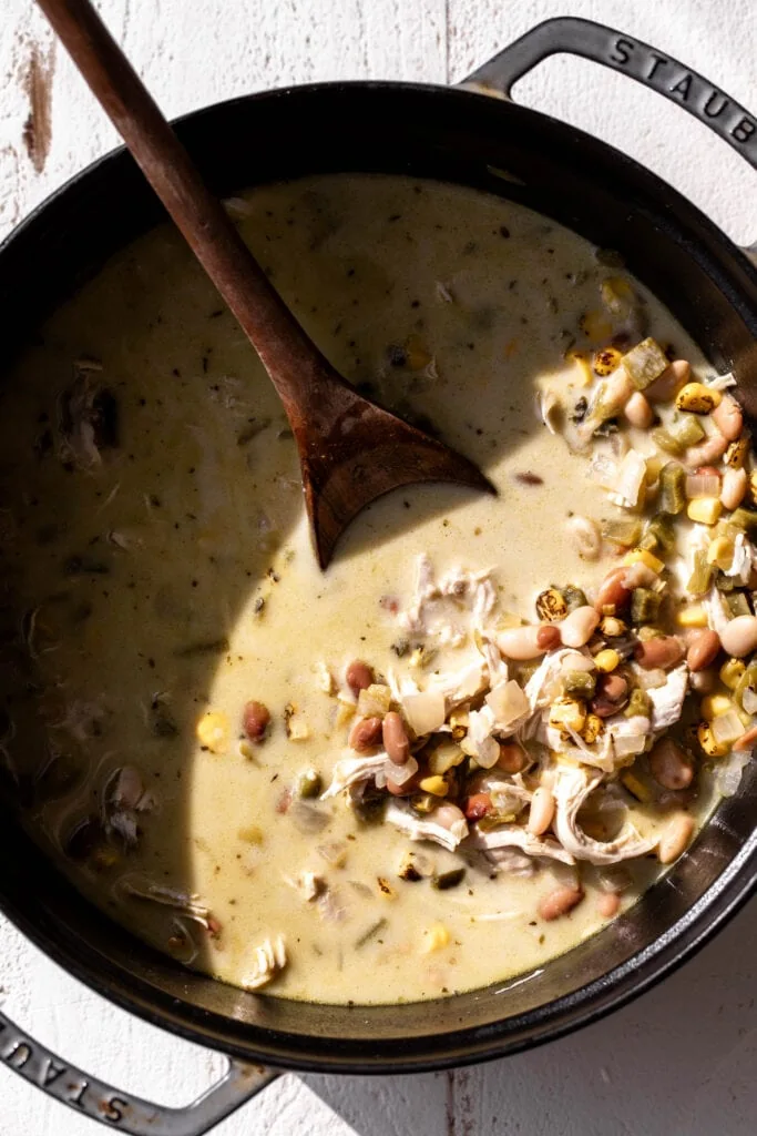 shredded chicken with corn, beans, and cream