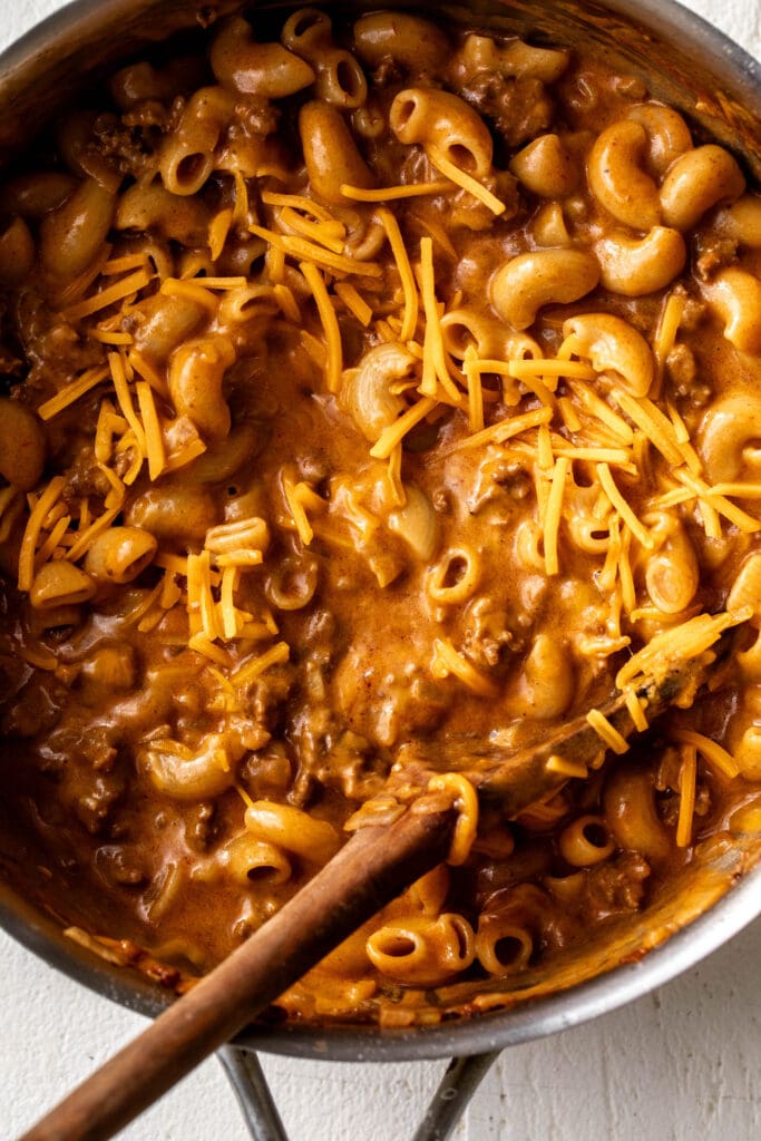 homemade hamburger helper made with ground beef, pasta, and cheddar cheese.
