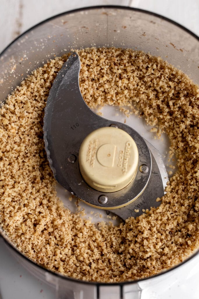 ground walnuts in food processor for Strawberry Lime Polvorones.