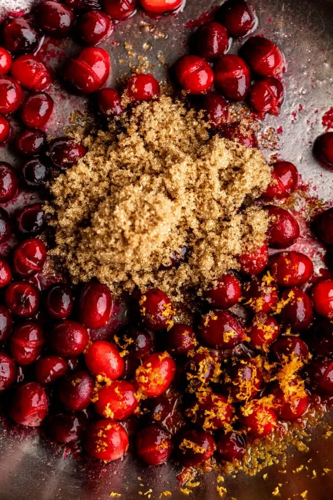 sugar and orange cranberry pan sauce with whole cranberries.