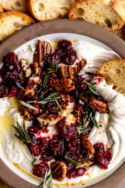 whipped goat cheese with cranberries pecans and rosemary.