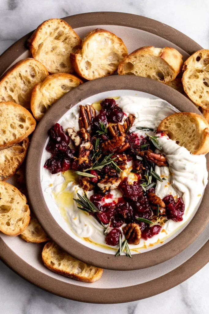 whipped goat cheese with cranberries pecans and rosemary.