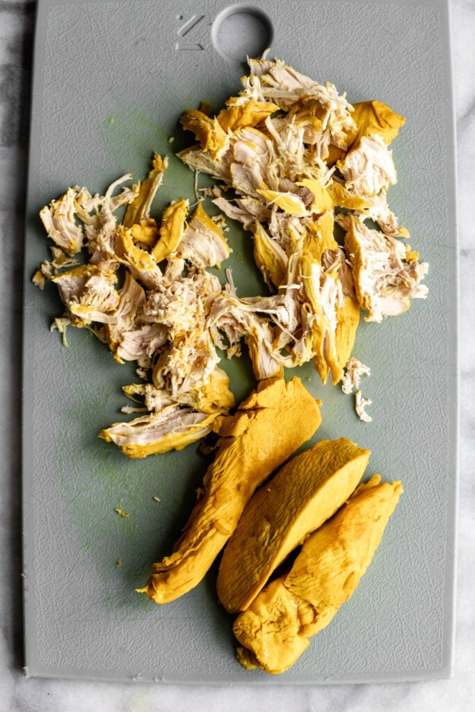 turmeric poached chicken breast shredded.