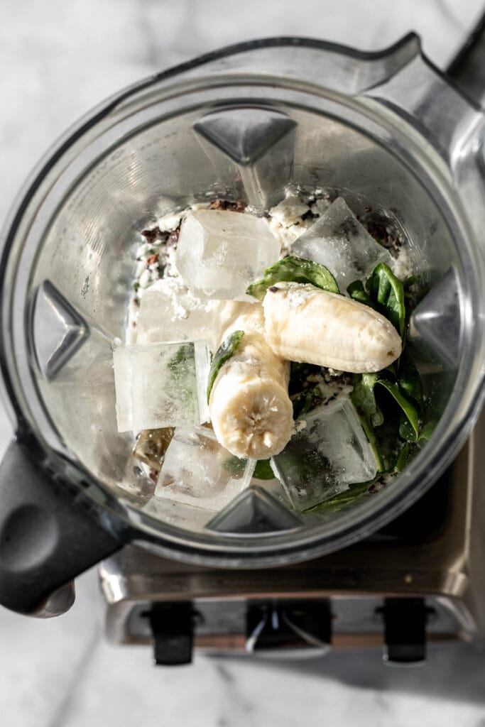 mint chocolate chip smoothie ingredients in blender.