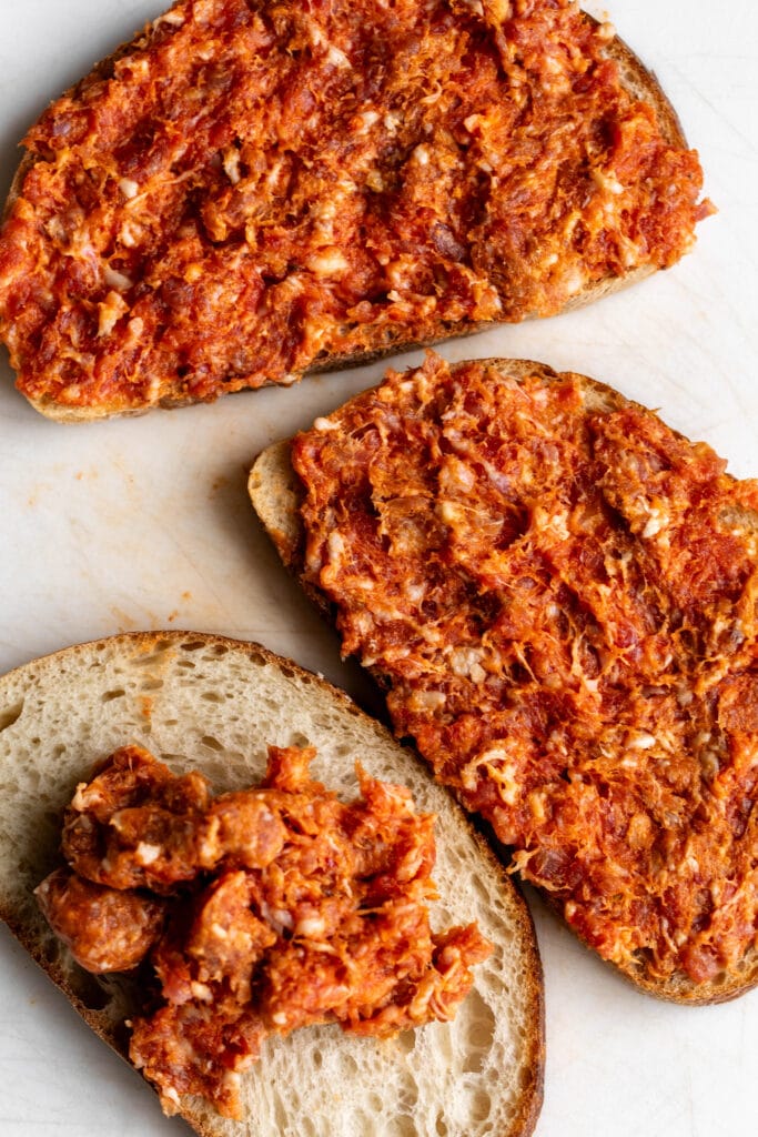 hot Italian sausage pressed onto sourdough bread slices.