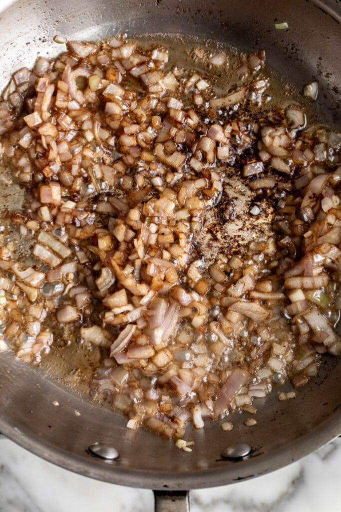 Sautéd shallots in rendered duck fat.