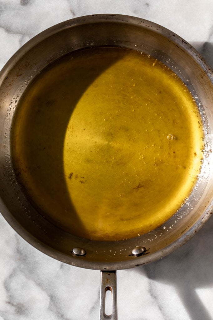 clarified butter in sauté pan.