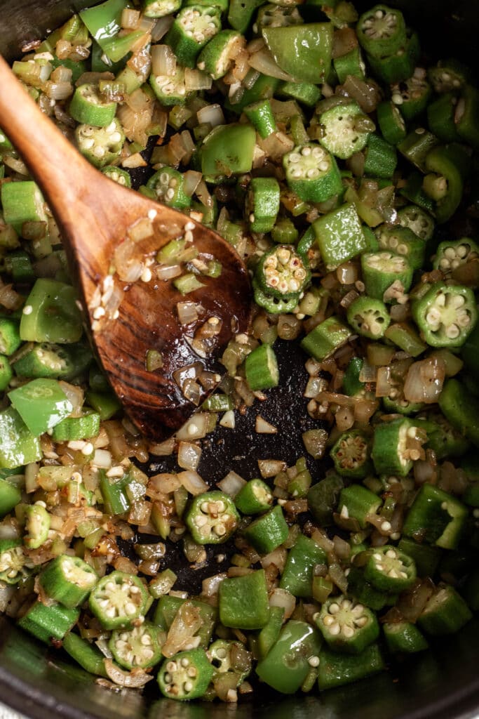 okra and garlic cooked with celery. onion and green bell pepper.