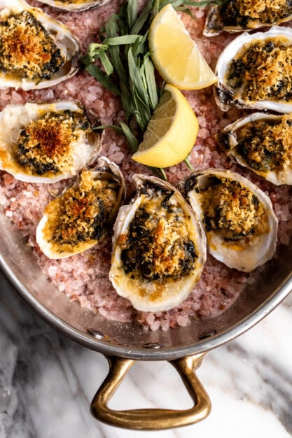 oysters rockefeller over rock salt.
