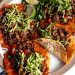 spiced ground beef with romaine lettuce, pico de gallo and cheese.