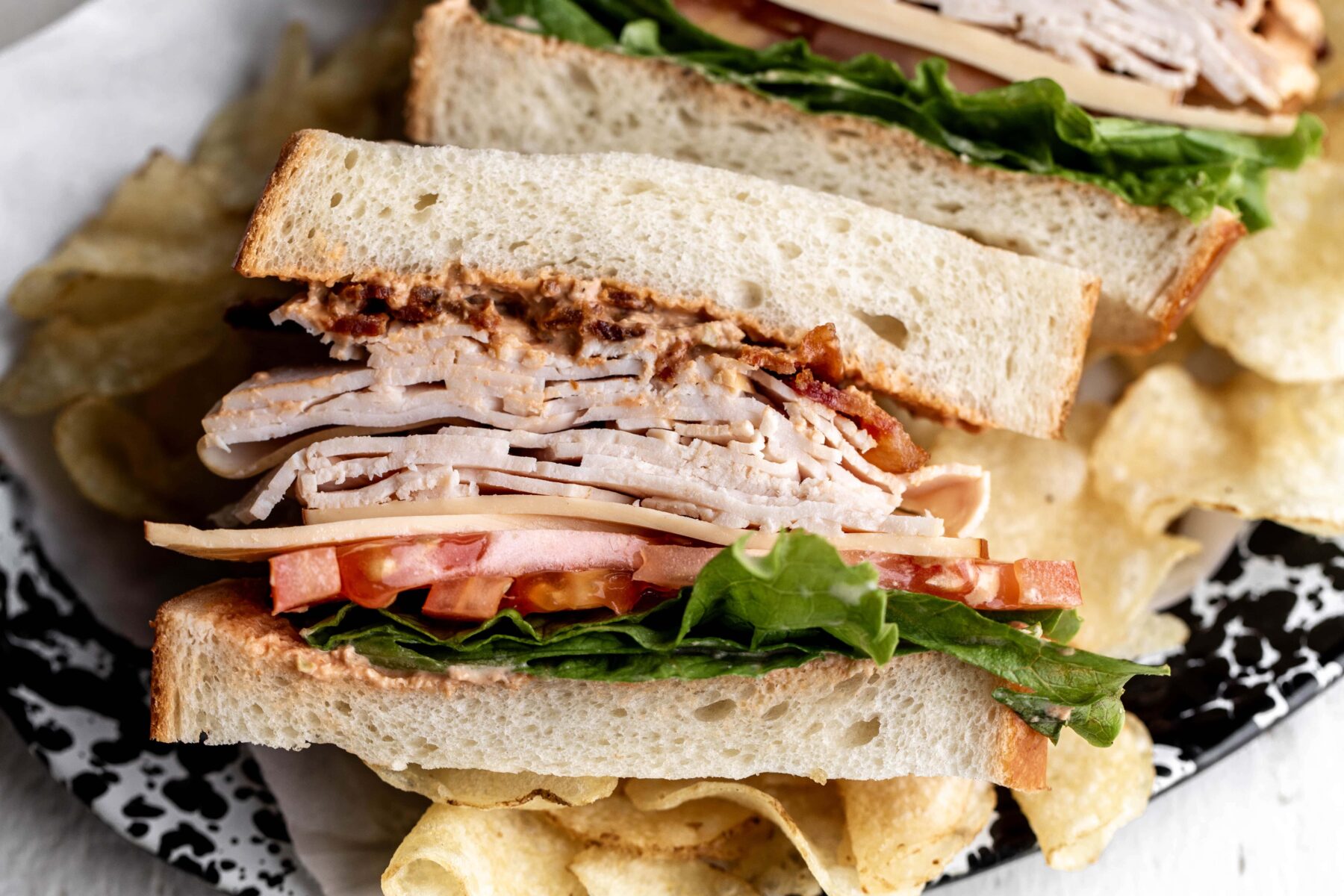 Bacon turkey garden sandwich with lettuce and tomato.