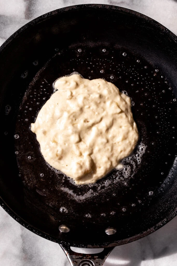 fried pancake batter in butter bubbling.