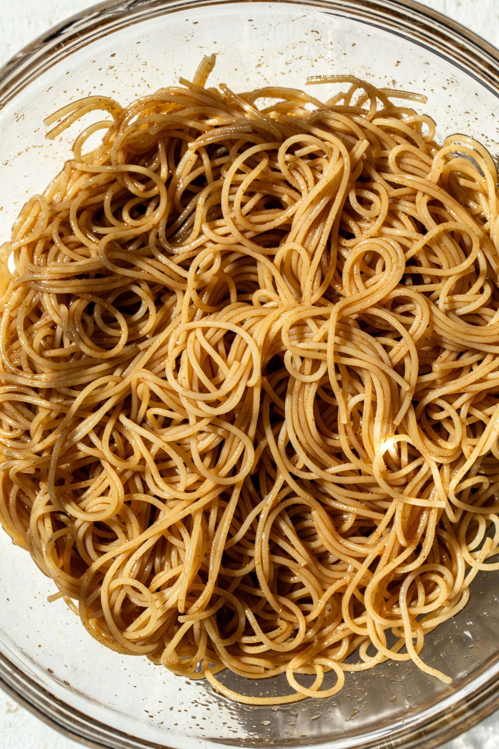 thin spaghetti noodles tossed in soy and coriander sauce.