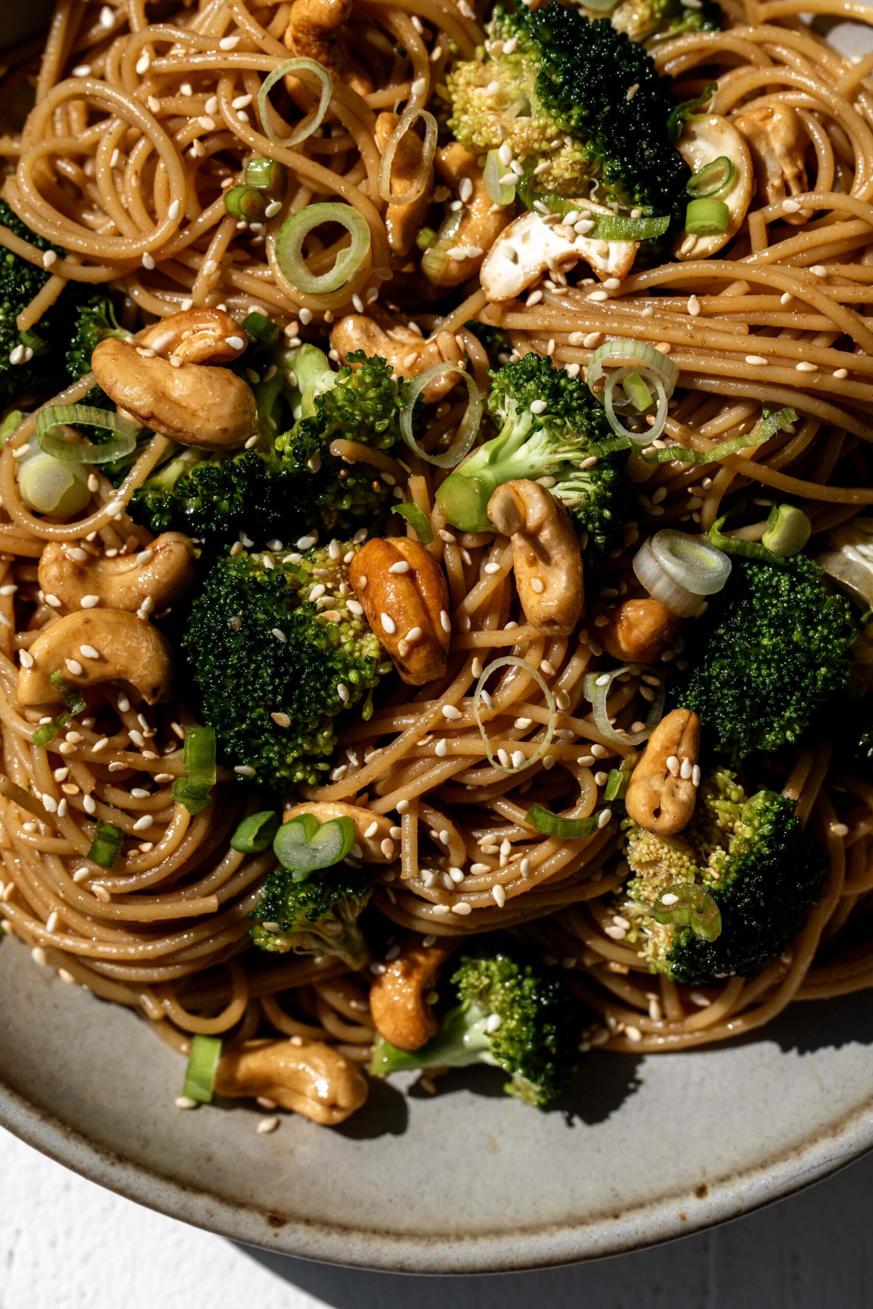 cold chinese-inspired noodles with cashews and coriander