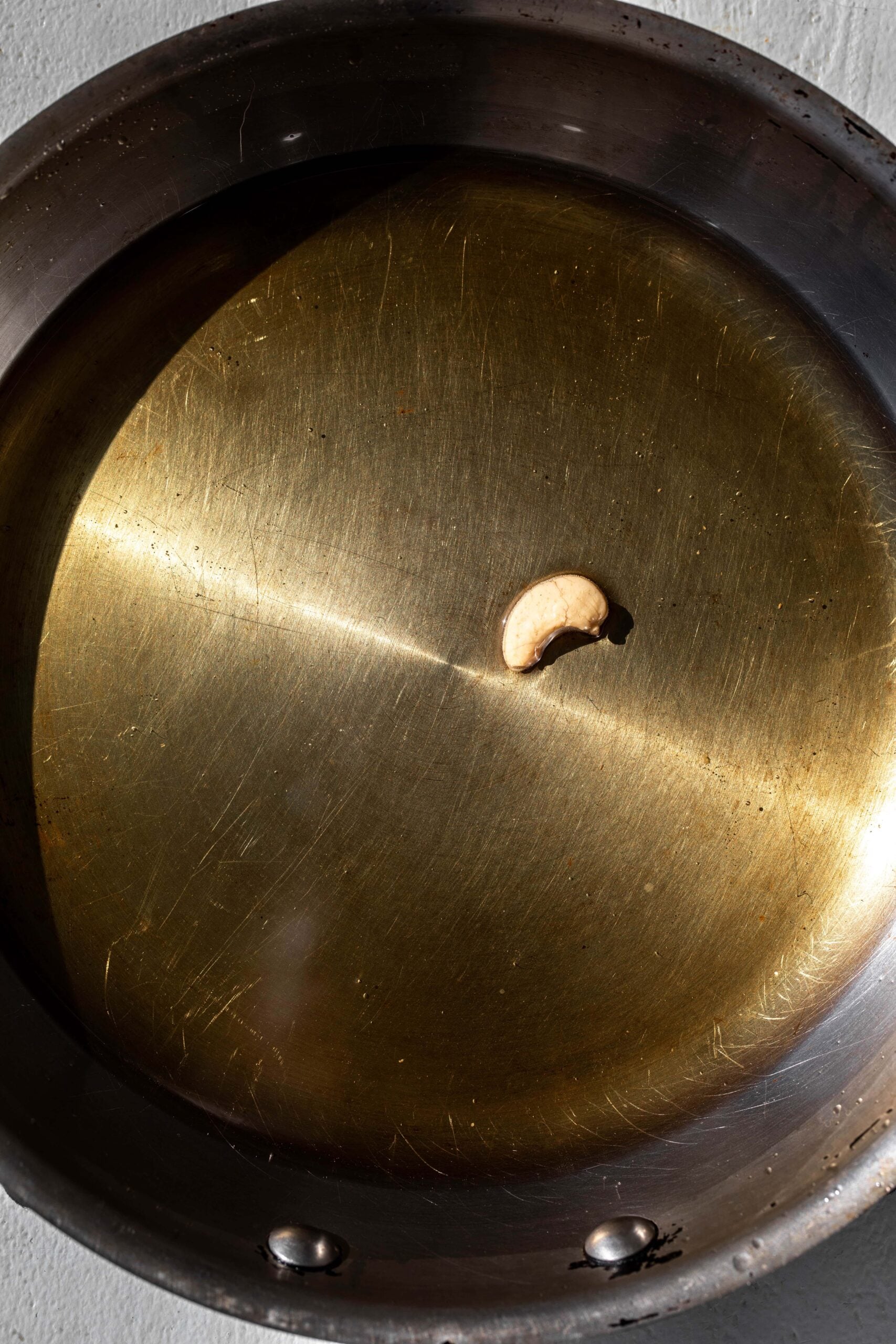 vegetable oil and sesame oil heated in pan.