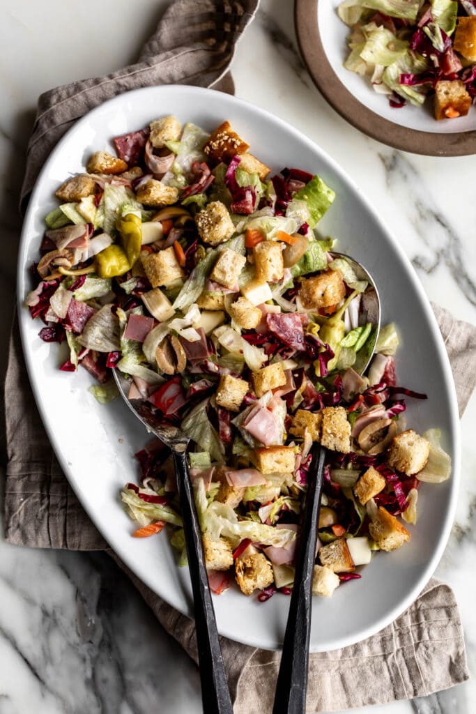 tossed and served Muffaletta Salad.