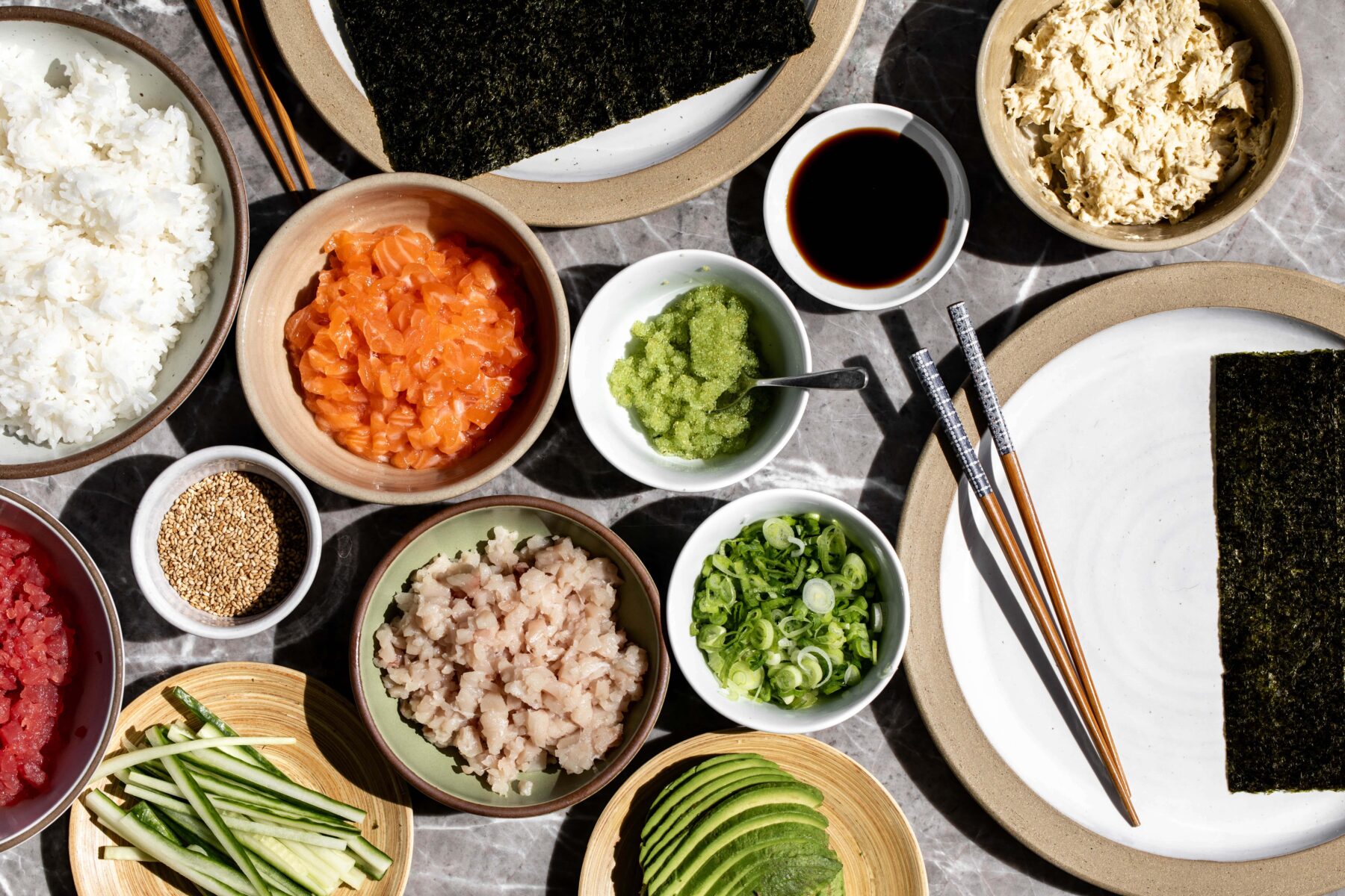 Separated ingredients for at home temaki hand roll temaki bar.