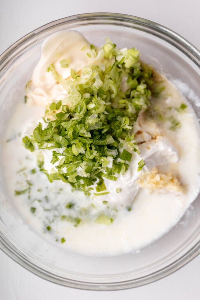 Mixed ingredients for Blue Cheese Dip in bowl.