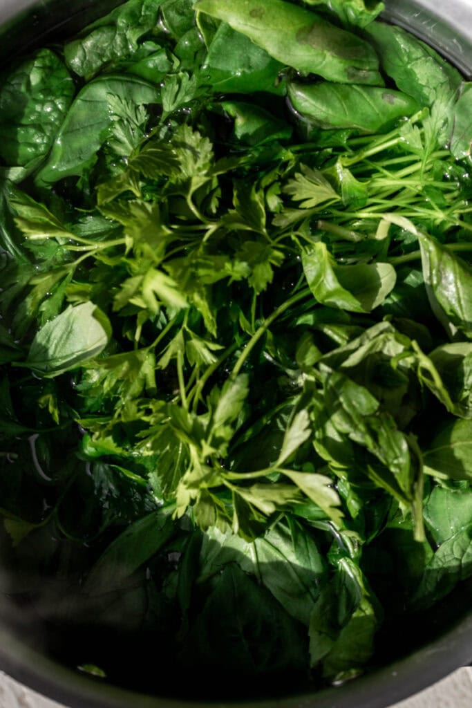 blanch spinach and herbs for Spring Rice Pilaf with Pistachio Pesto