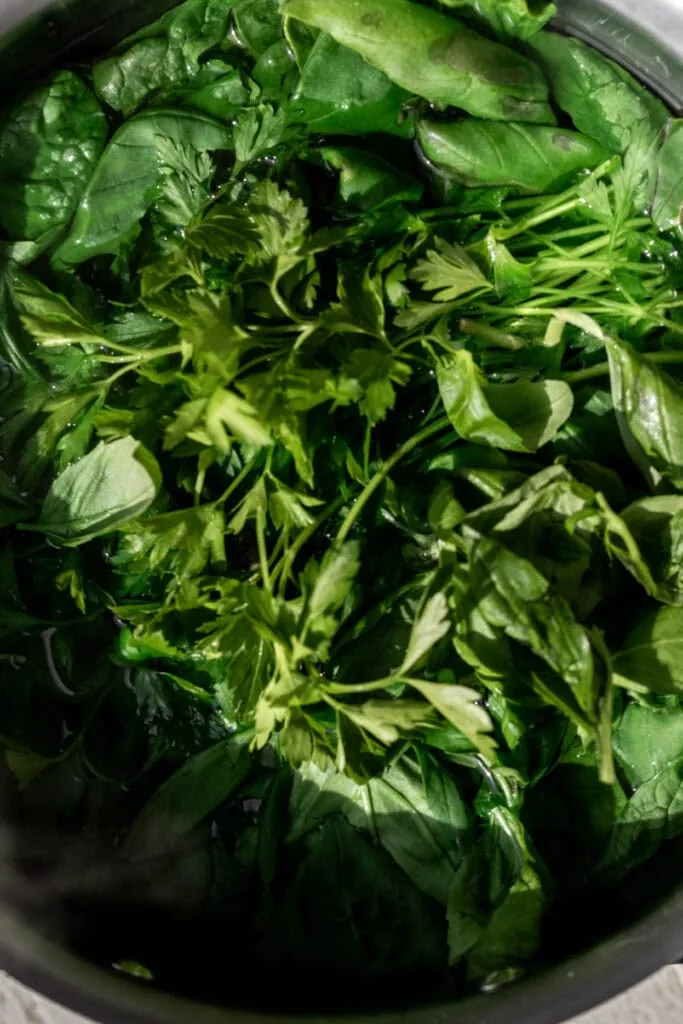 Blanched spinach and herbs for Spring Rice Pilaf with Pistachio Pesto.