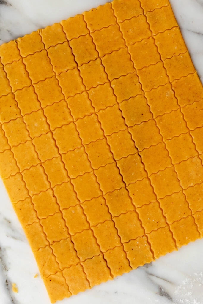 rolled out cheddar cracker dough.