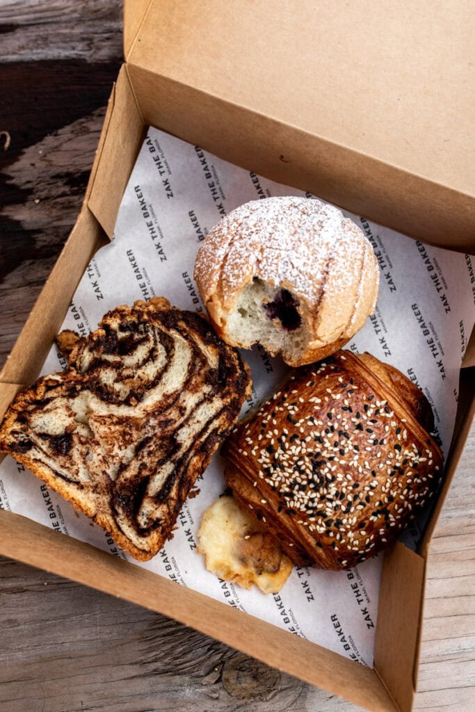 salmon bacon and cheese croissant with babka and concha.