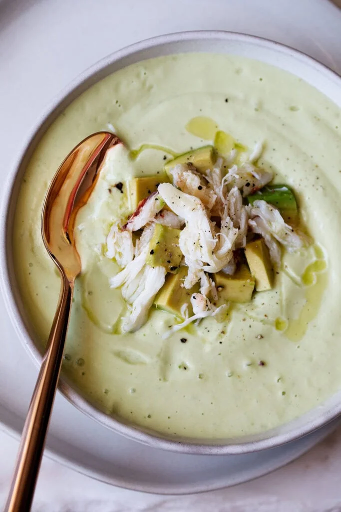 green avocado cucumber lime gazpacho topped with crabmeat
