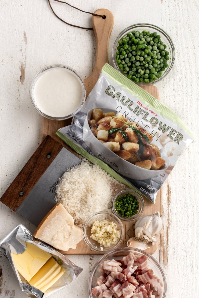 ingredients to make trader joes cauliflower gnocchi with peas and bacon.