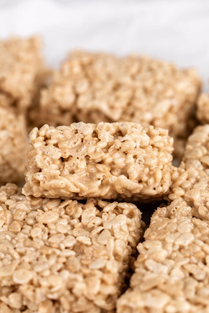 cooled rice krispie treats cut into squares.
