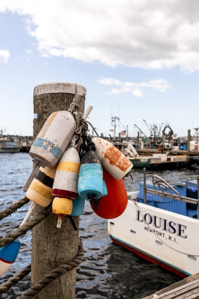 buoys tied up on dock.