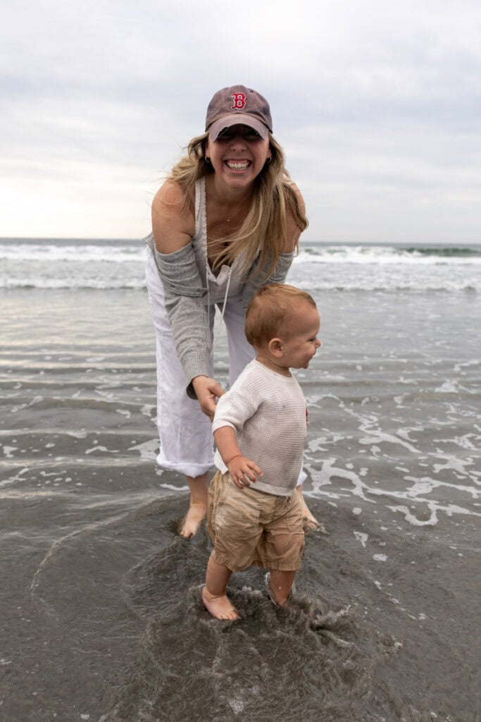 playing with baby in water.