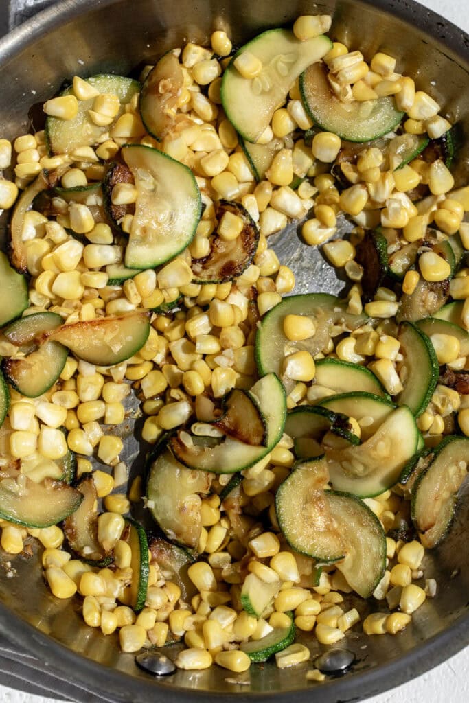 sautéed zucchini with corn and garlic.