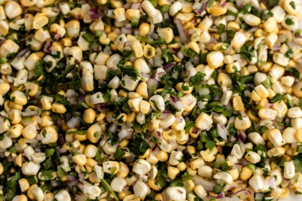 fresh roasted corn salsa with cilantro and jalapeño.