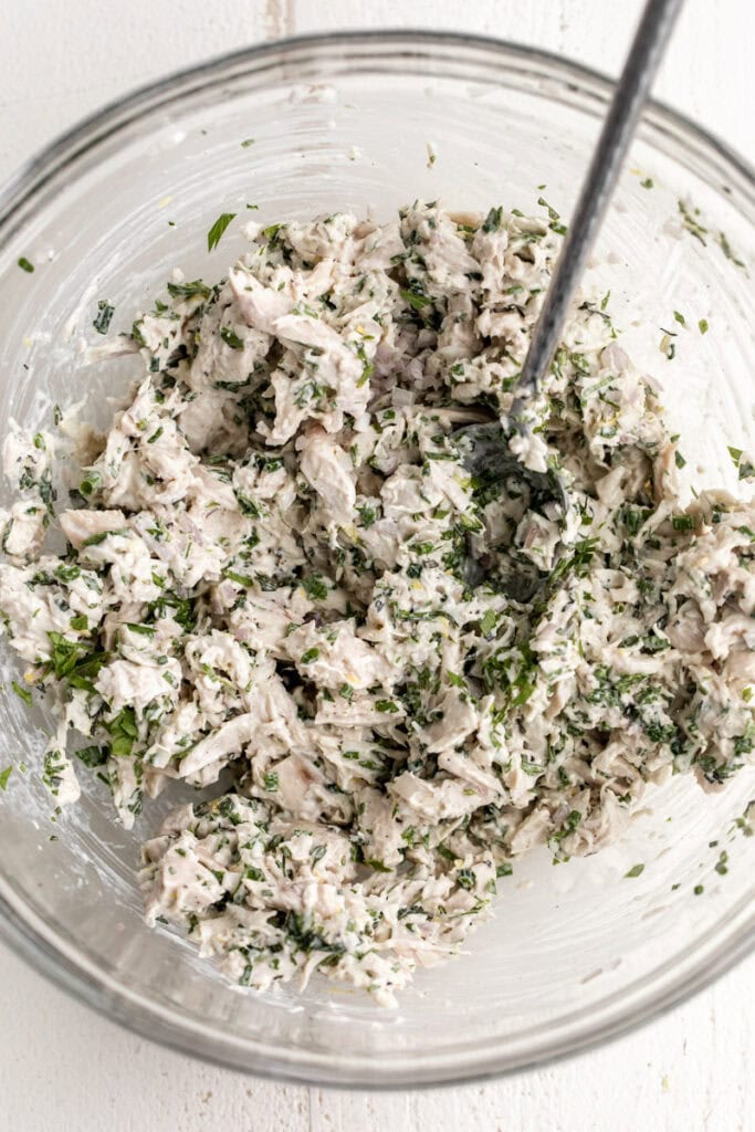 herbed chicken salad mixture in bowl.