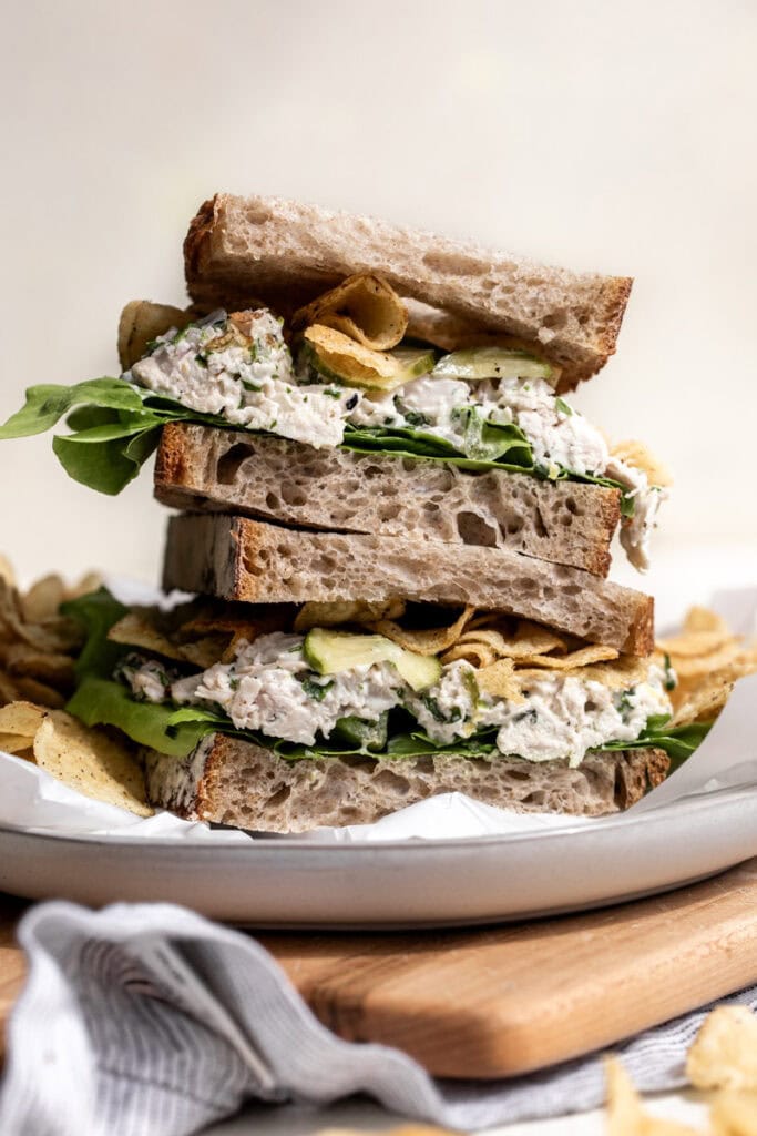 the best chicken salad sandwich recipe with pickles and potato chips.