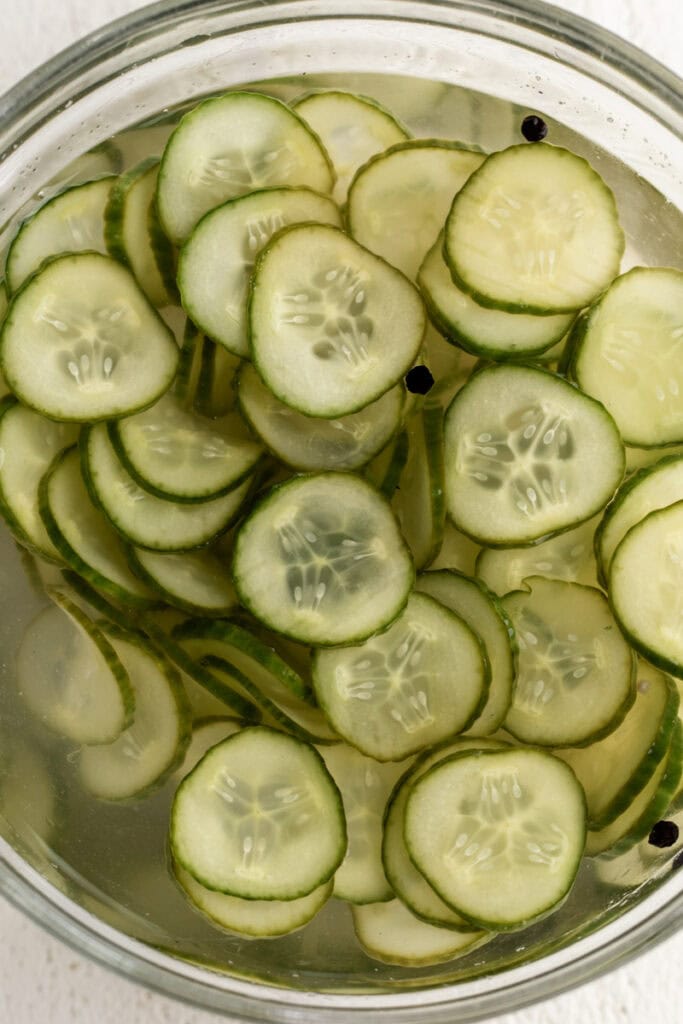 homemade quick pickles in glass mixing bowl.